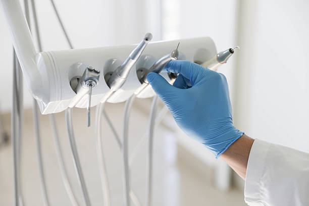 Professional Tooth Extraction technician working in Lake County County, FL